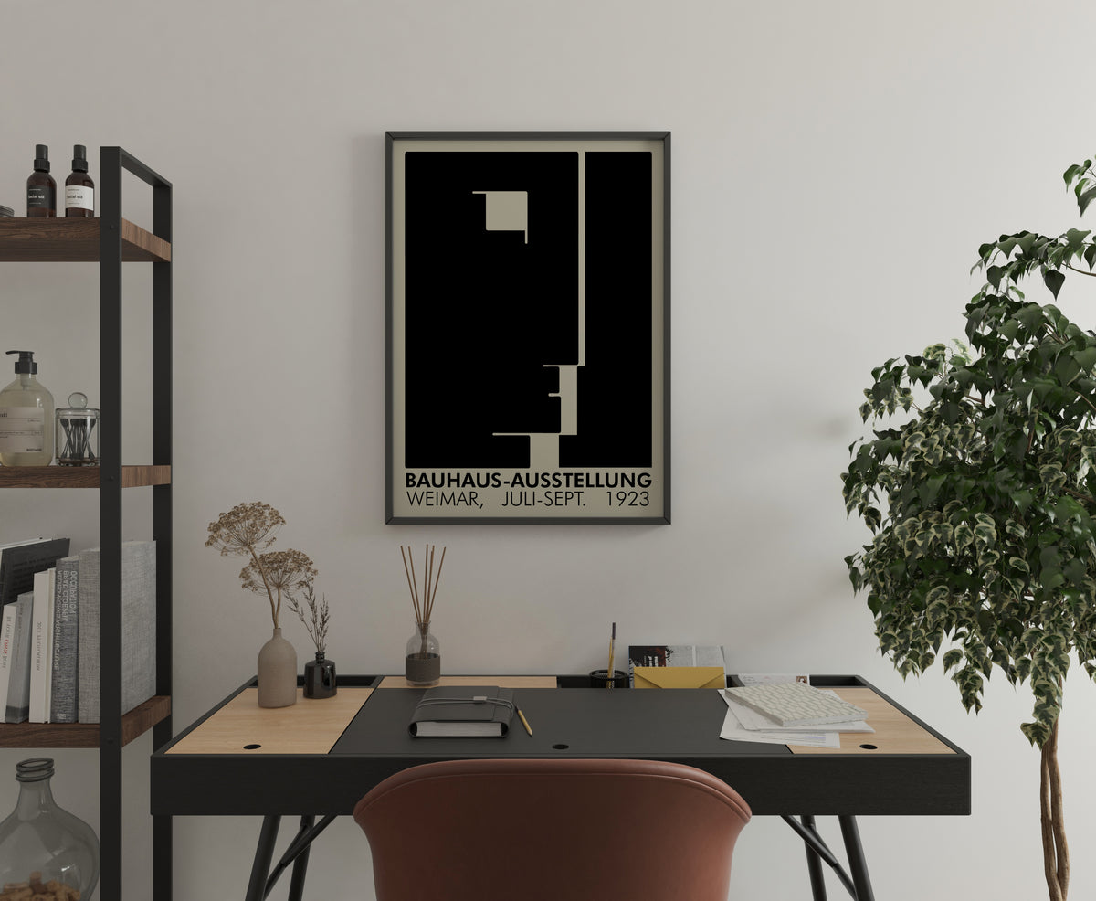 Bauhaus-Exhibition Weimar 1923 poster on wall above desk