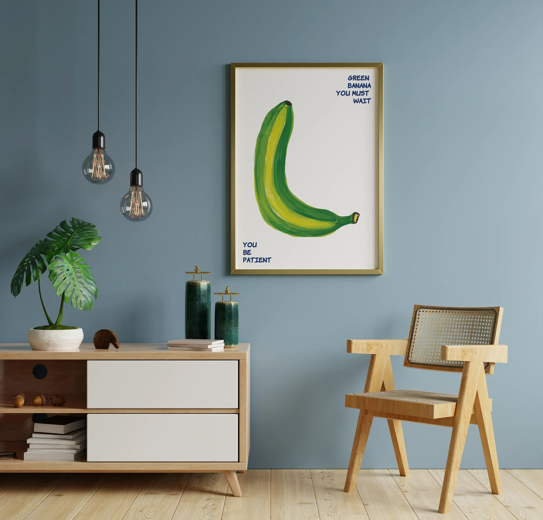 Kitchen and dining room interior with blue wall, framed banana wall art, wooden chair and modern sideboard