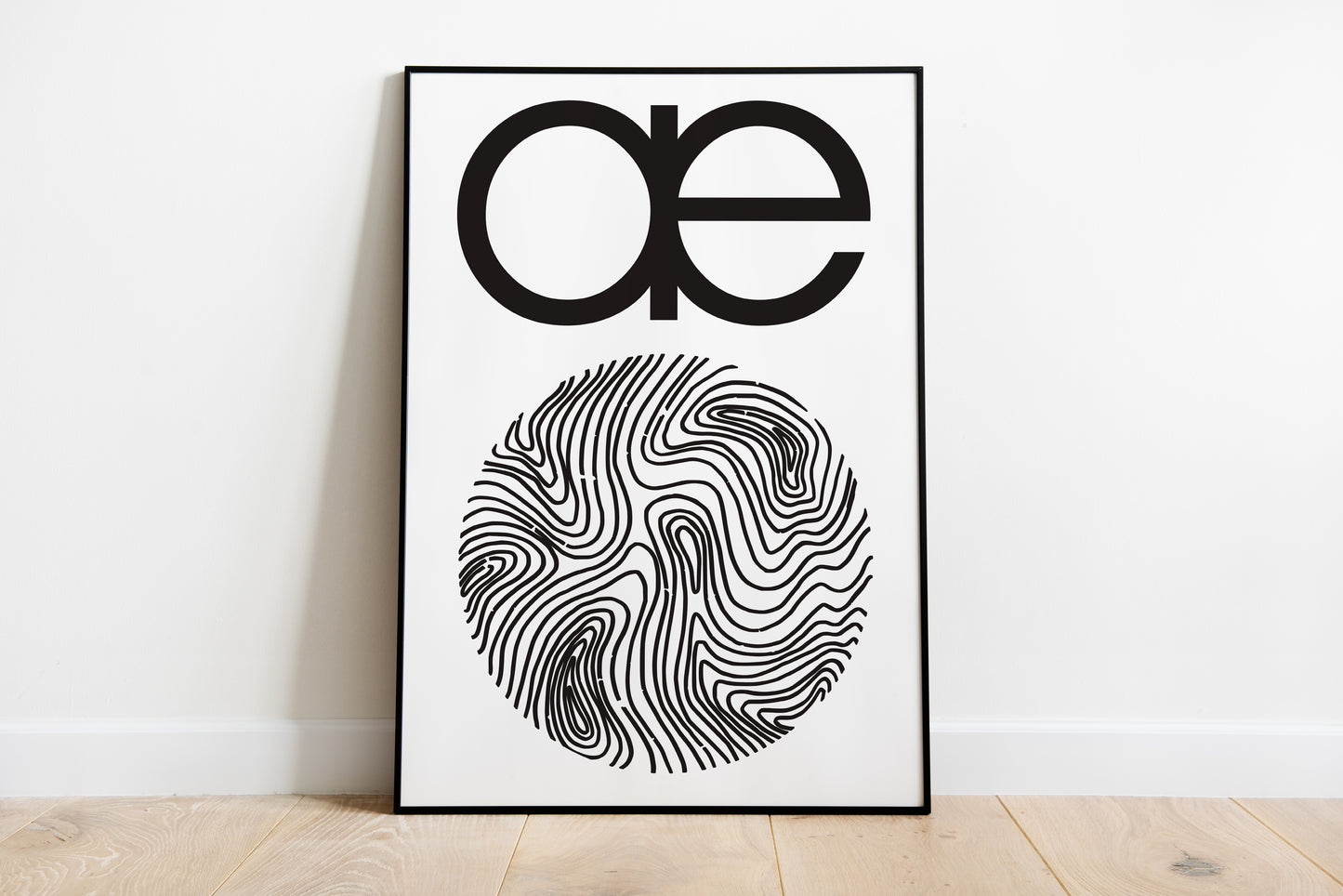 Abstract electronic music album cover style wall art poster featuring bold ae typography and a circular fingerprint-style graphic in black on a white background, displayed on a wall.
