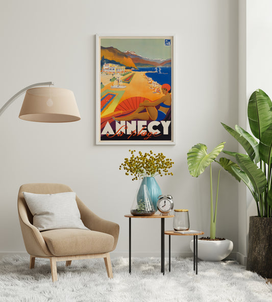 Vintage-style Annecy print with geometric lettering and a lakeside holiday scene in a living room
