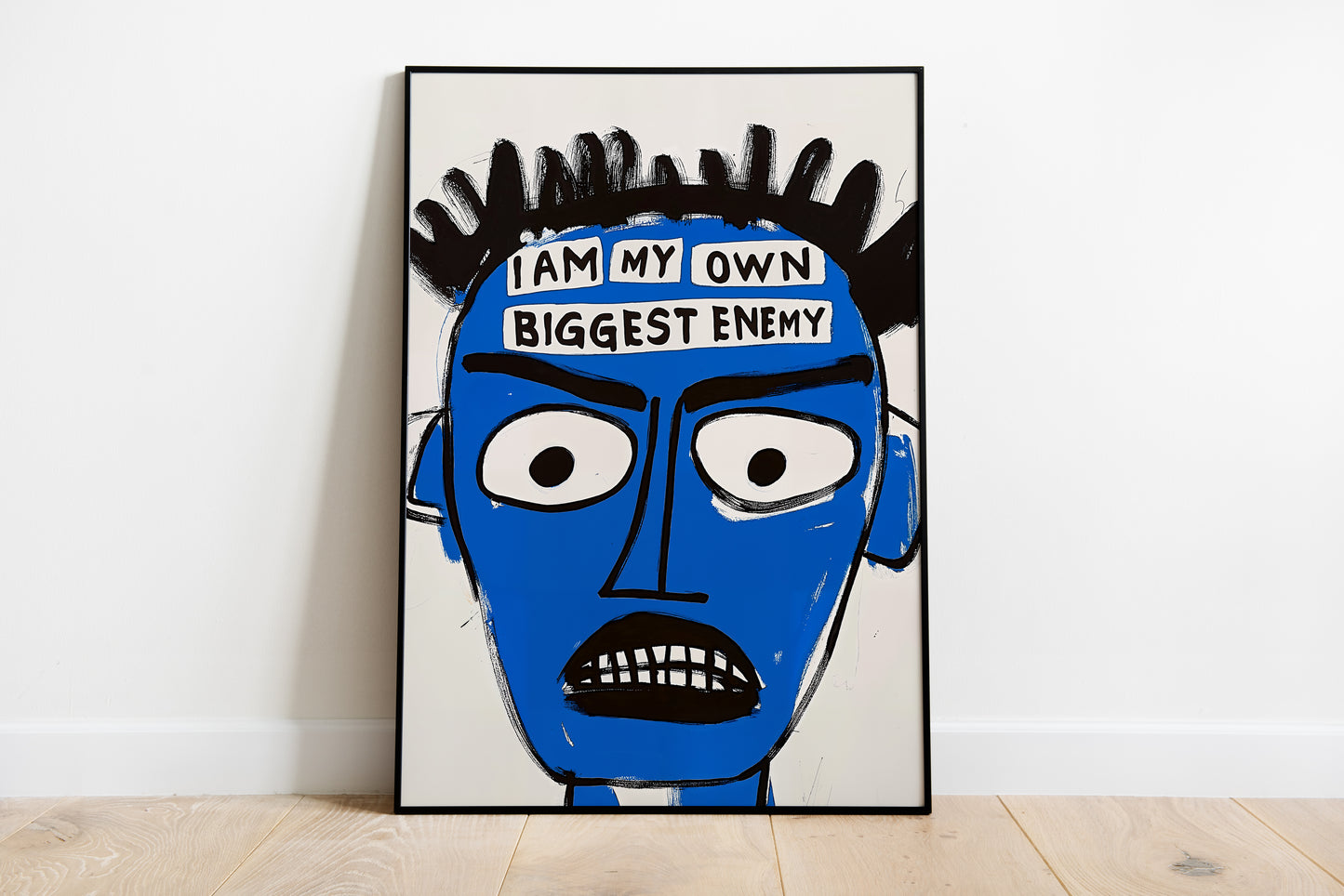 Jean-Michel Basquiat-style blue face poster with “I am my own biggest enemy” text