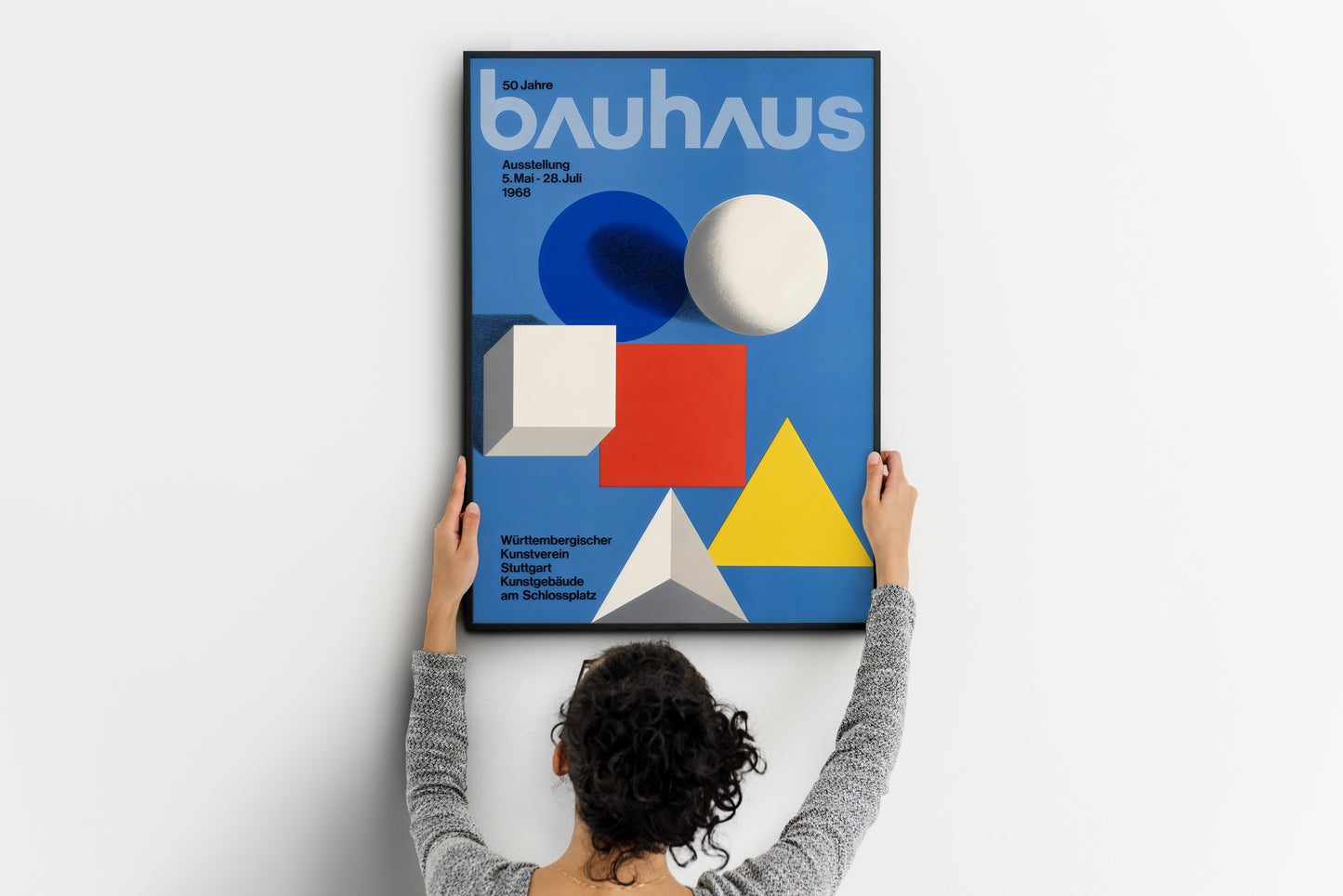 Bauhaus poster with geometric shapes and primary colors on blue background