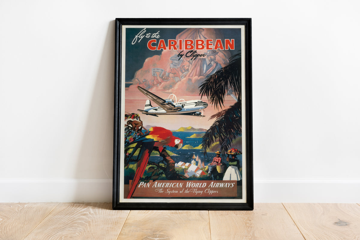 Caribbean airline travel poster with plane, island scenery and bold red lettering in a living room