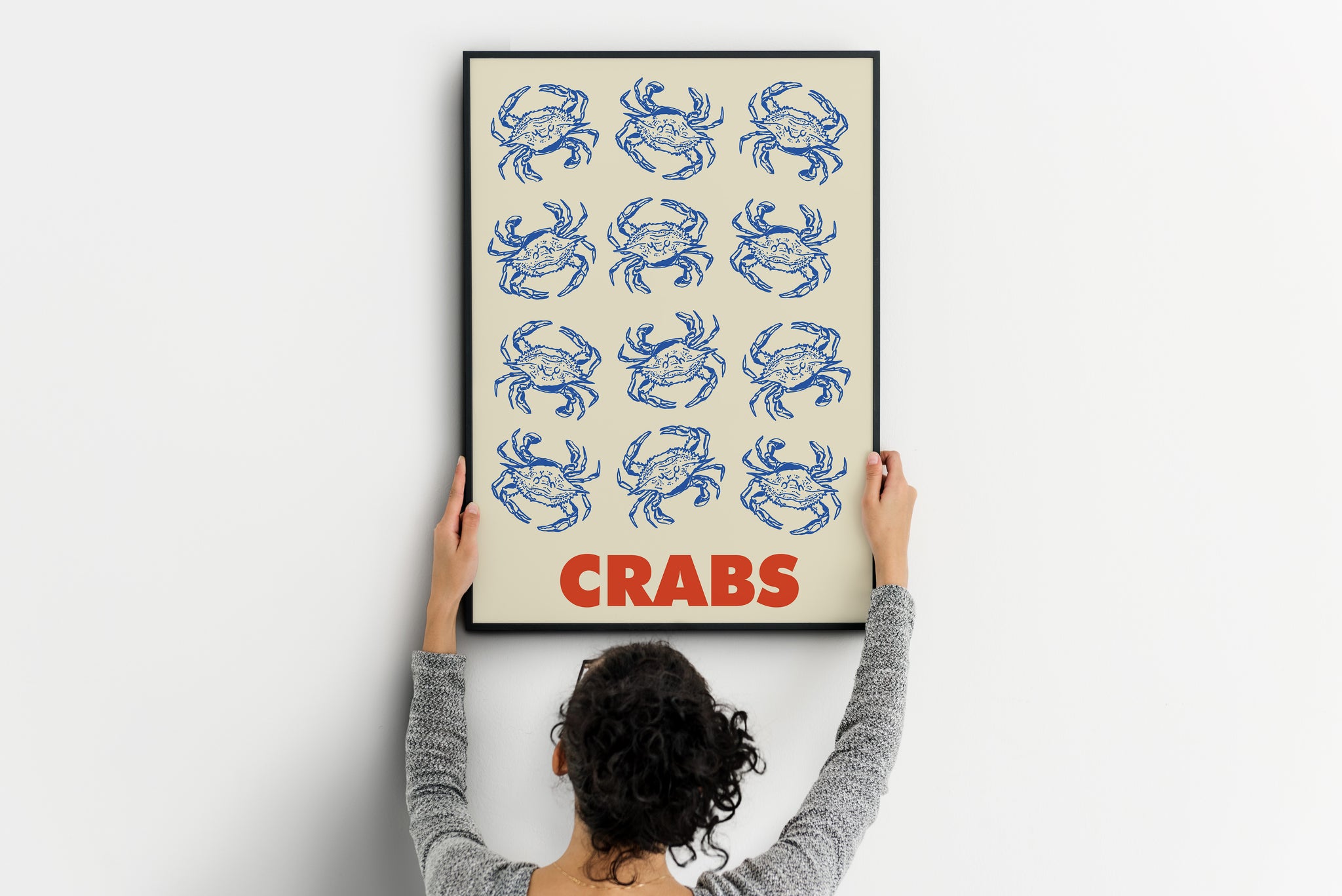 	Vintage seafood illustration wall art featuring a grid of blue crab drawings and bold red “CRABS” typography on beige background.