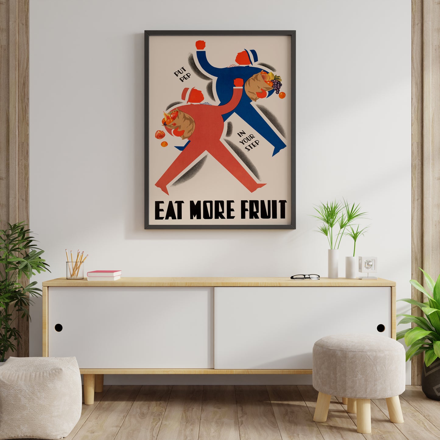 Eat More Fruit poster leaning on a minimal kitchen wall