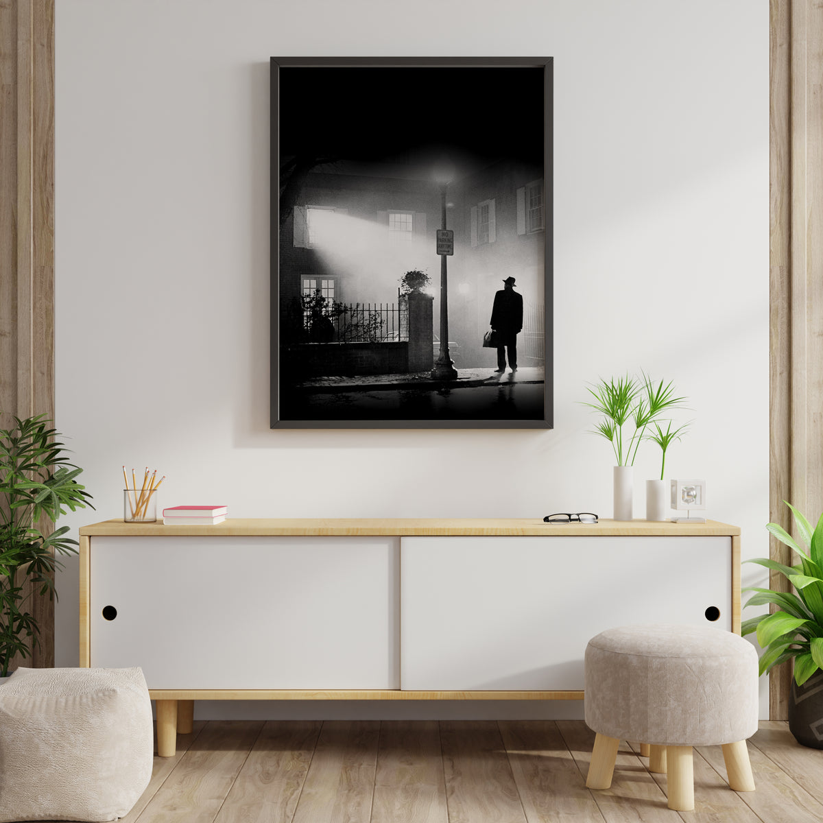 Exorcist movie poster featuring a black and white photograph of a solitary figure in a hat and coat standing on a wet street at night, illuminated by a streetlamp casting a beam through fog, with a building and windows in the misty background