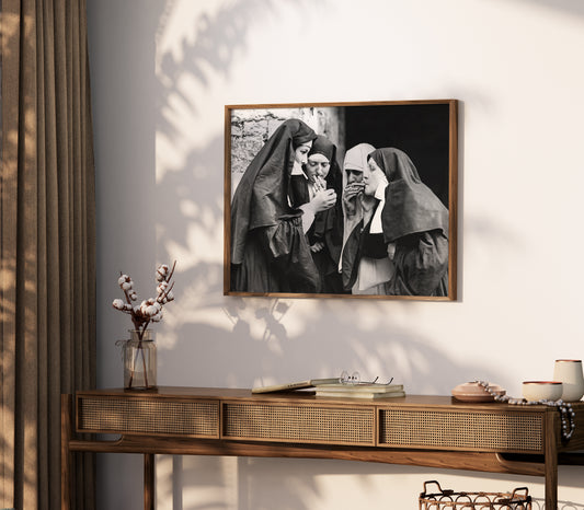 Smoking nuns photography poster used as a bold feature wall print in a living room.