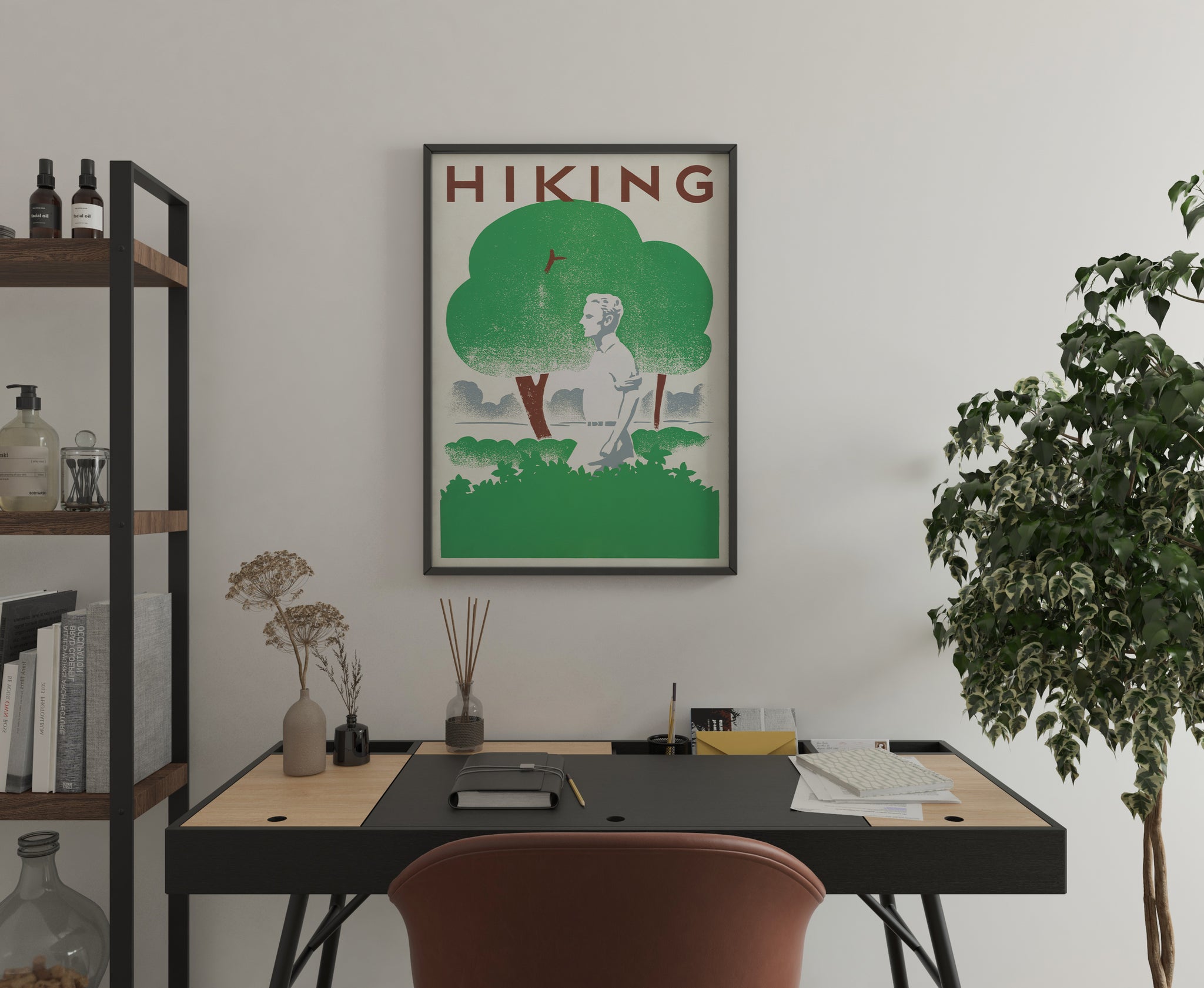 Hiking poster with vintage green landscape artwork displayed above a modern home office desk.