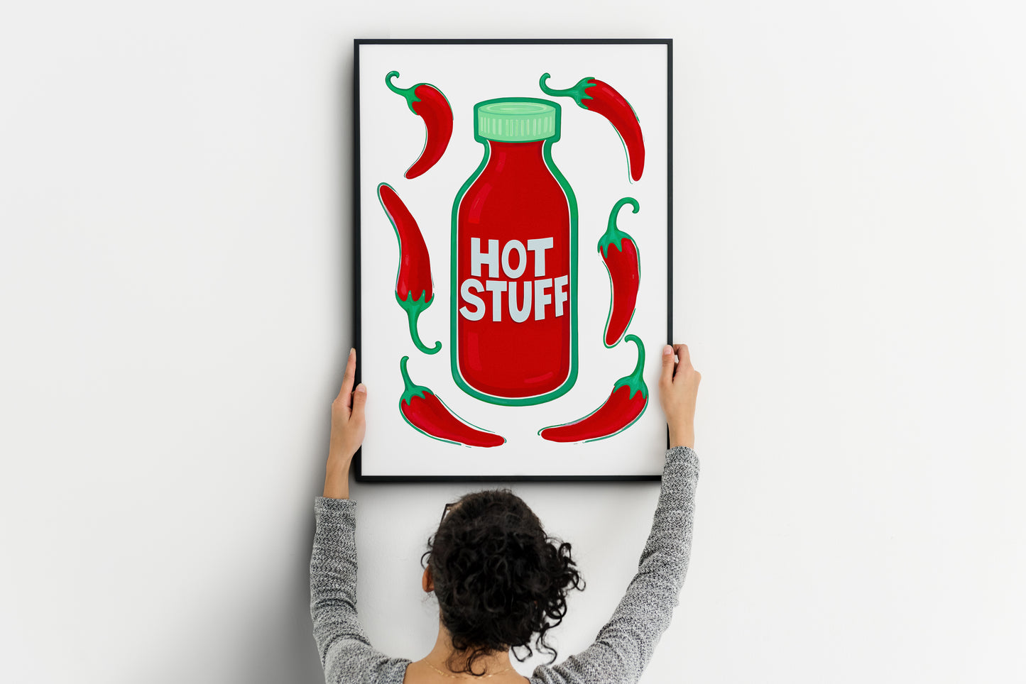 Hot Stuff sauce poster with red chilies, playful wall art for bar cart or home bar