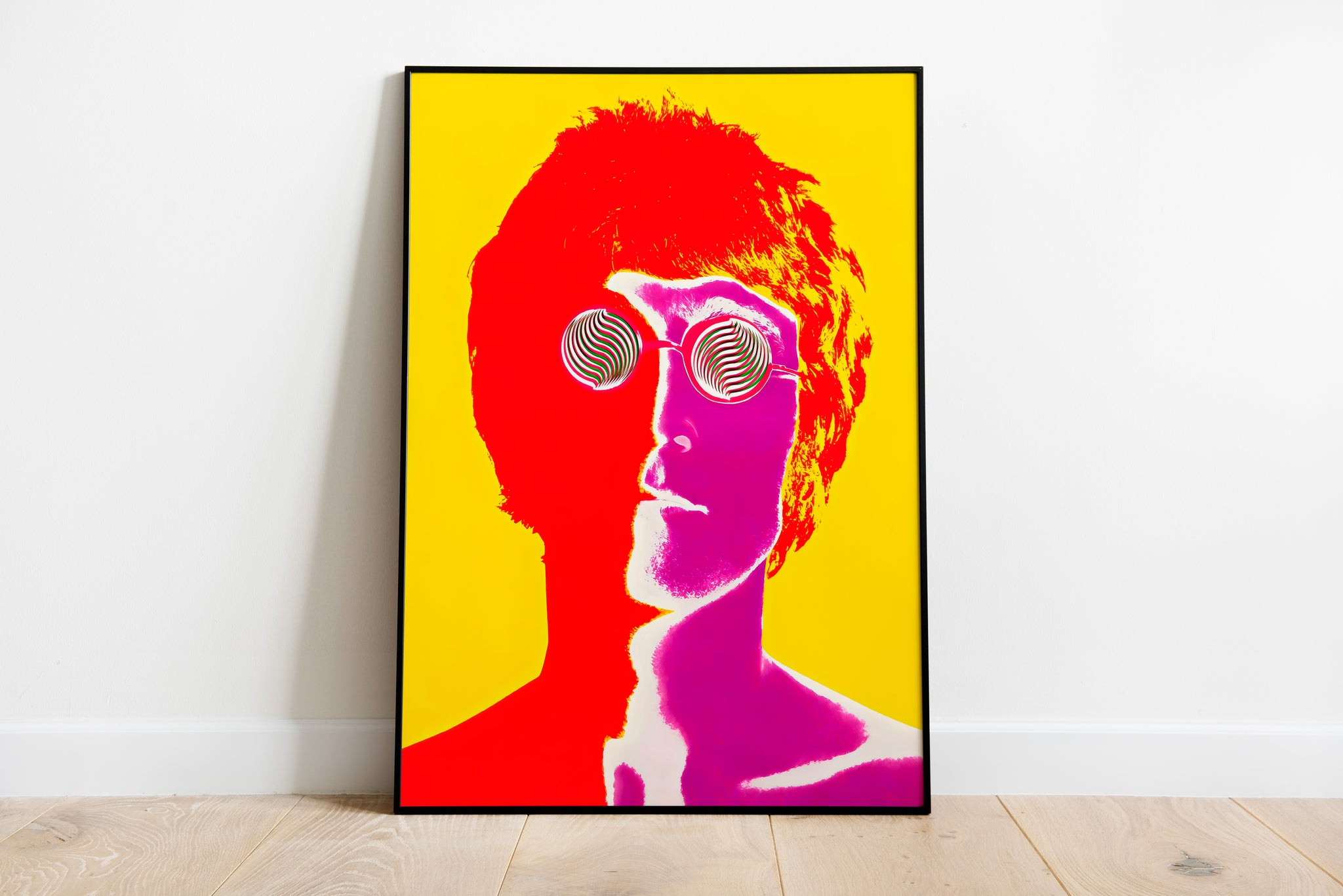 John Lennon poster with spiral glasses and vivid red, pink and yellow artwork for studio wall art
