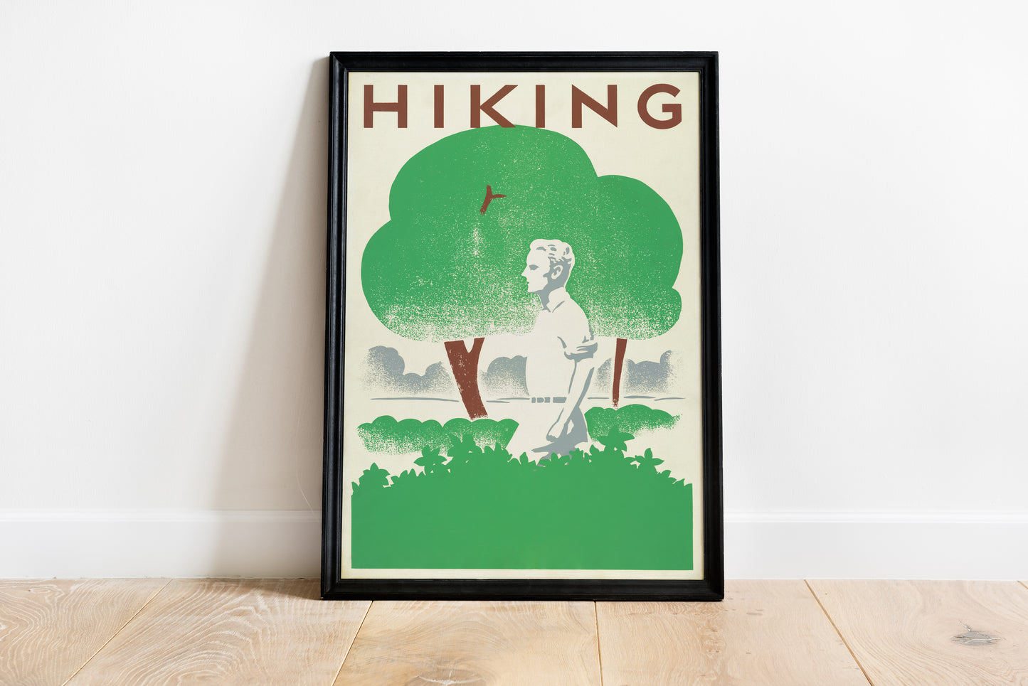 Close-up of an outdoor walking poster with green trees, layered foliage and retro screen-print texture.
