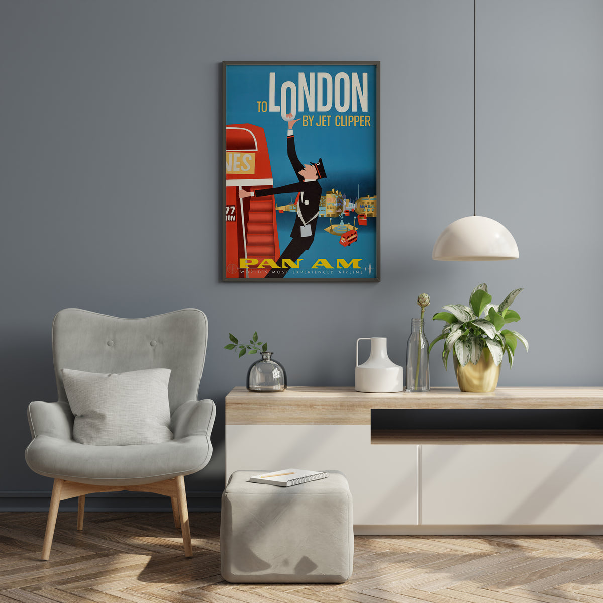 Vintage Pan Am London travel art with blue background, red bus and bold lettering in a living room