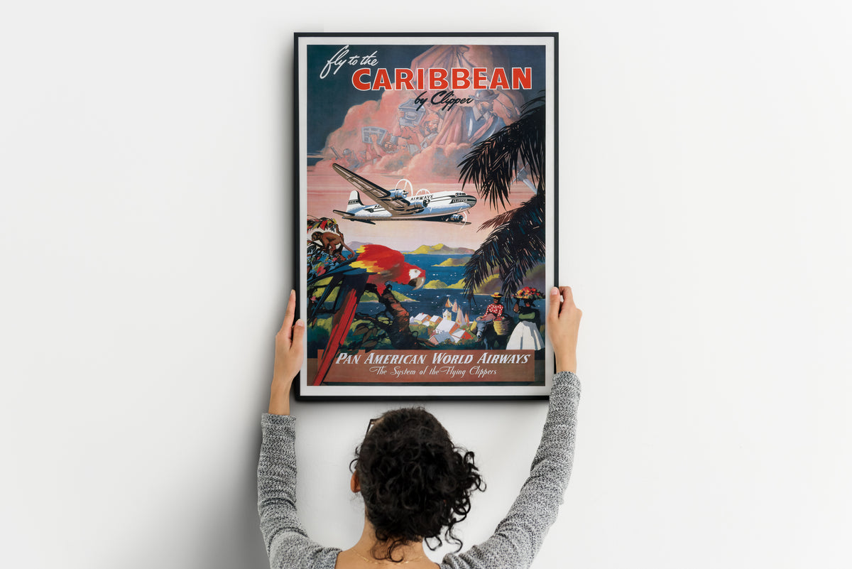 Pan American World Airways travel print with clipper aircraft, macaw and tropical Caribbean landscape