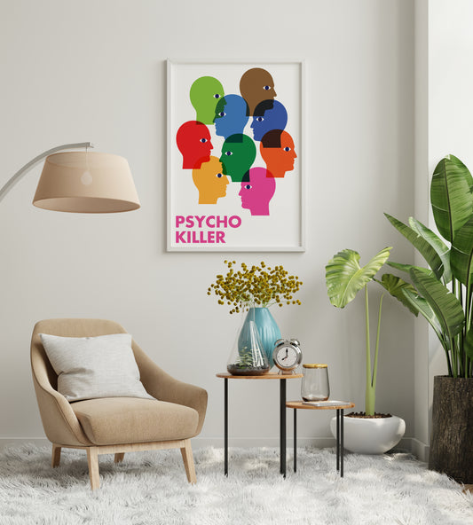 Psycho Killer print with nine colourful heads on a white background, displayed in a living room.