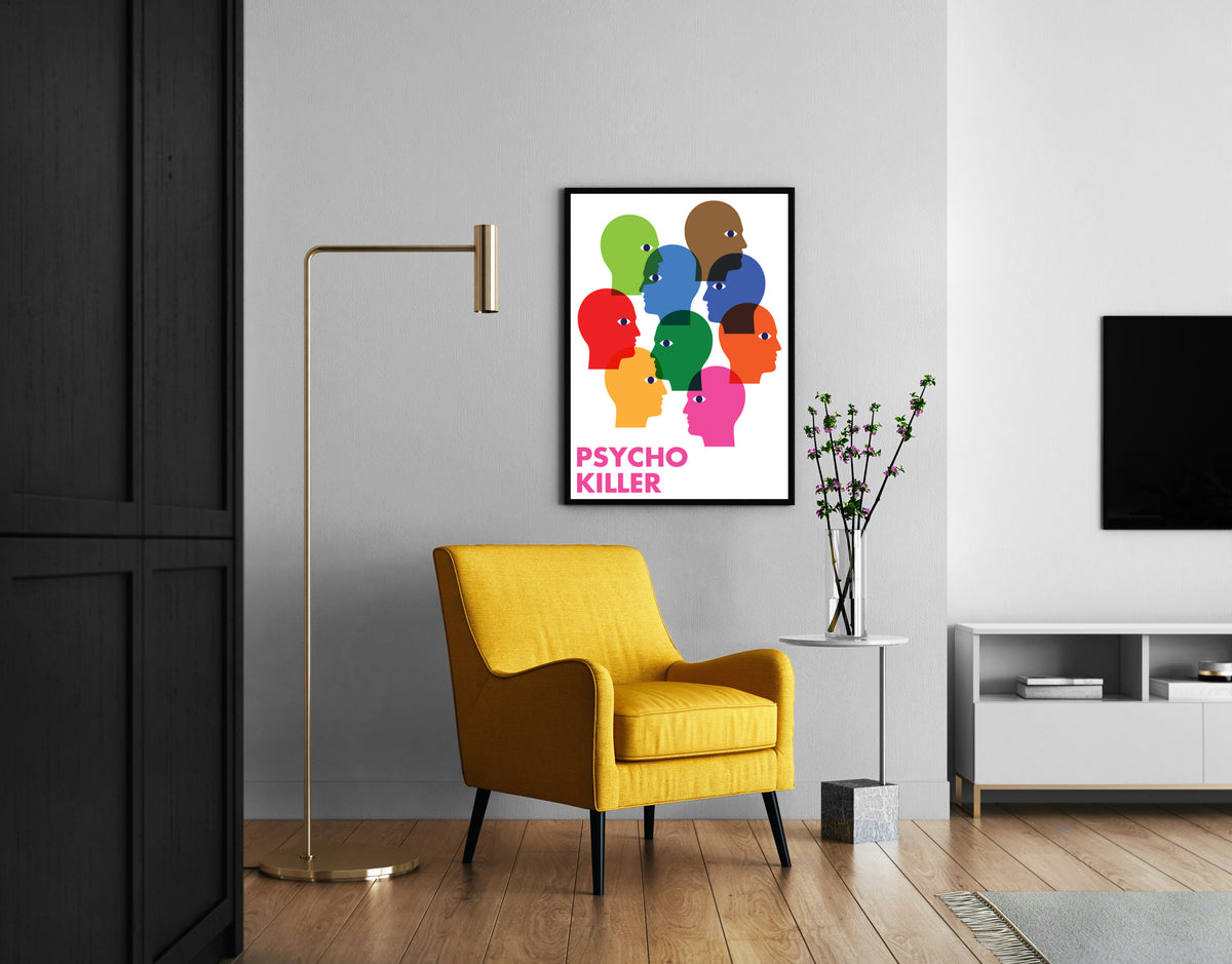 Psycho Killer poster with multicoloured profiles and pink text, shown in a living room setting.