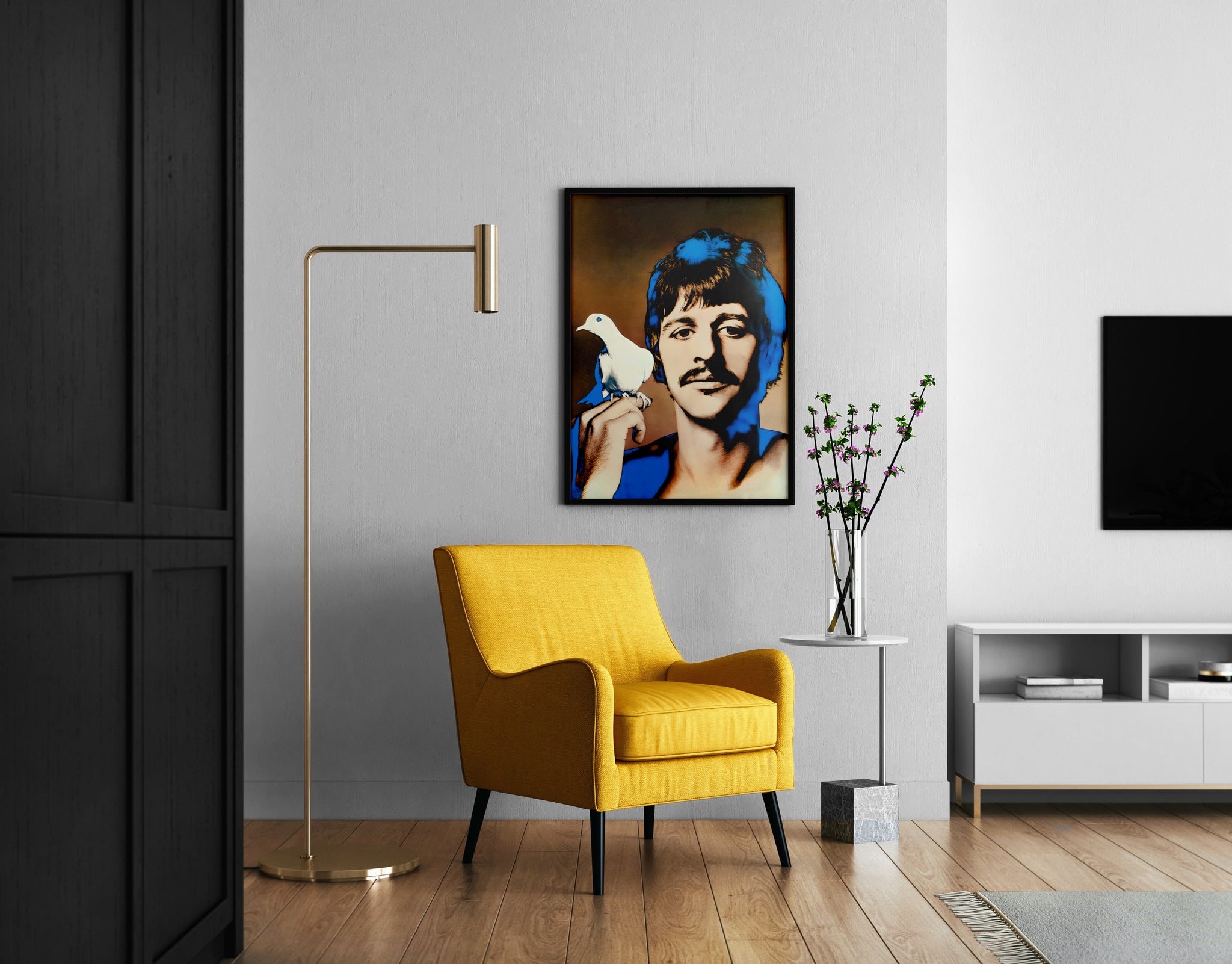 Ringo Starr pop-art poster displayed above a yellow chair in a modern reading corner