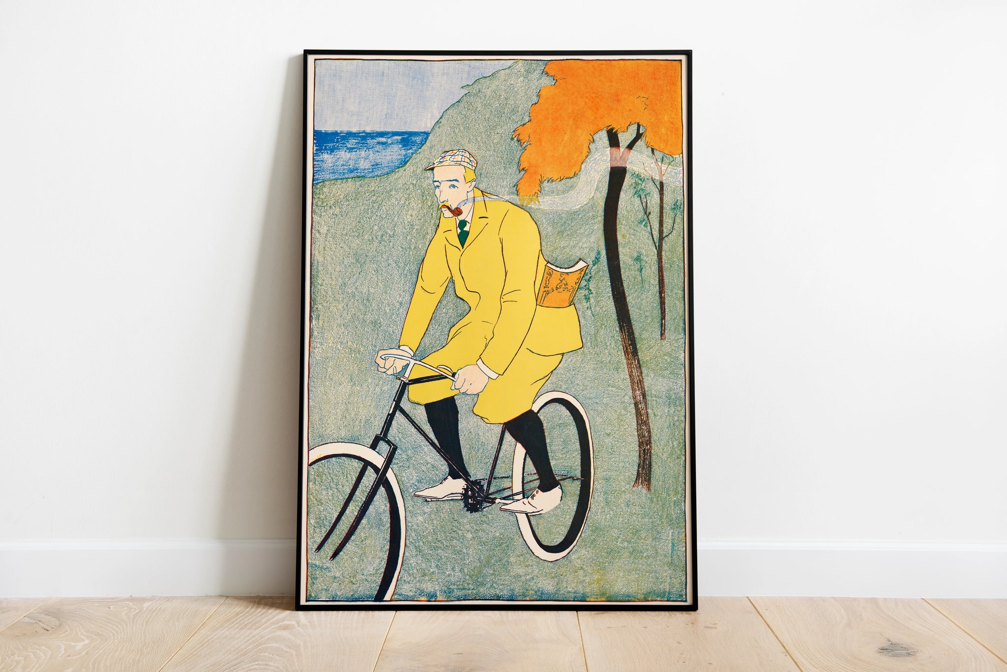 Vintage bicycle rider print with yellow coat and landscape artwork for home office wall art