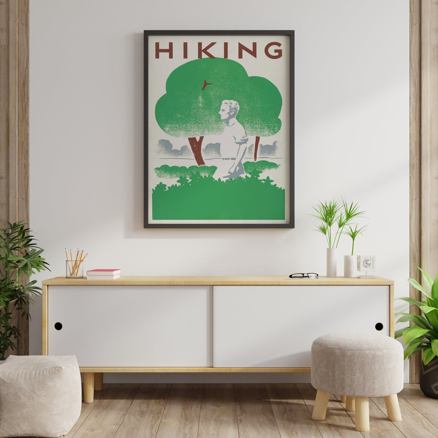 Vintage hiker print showing a walking figure in a green landscape, displayed as modern wall decor.