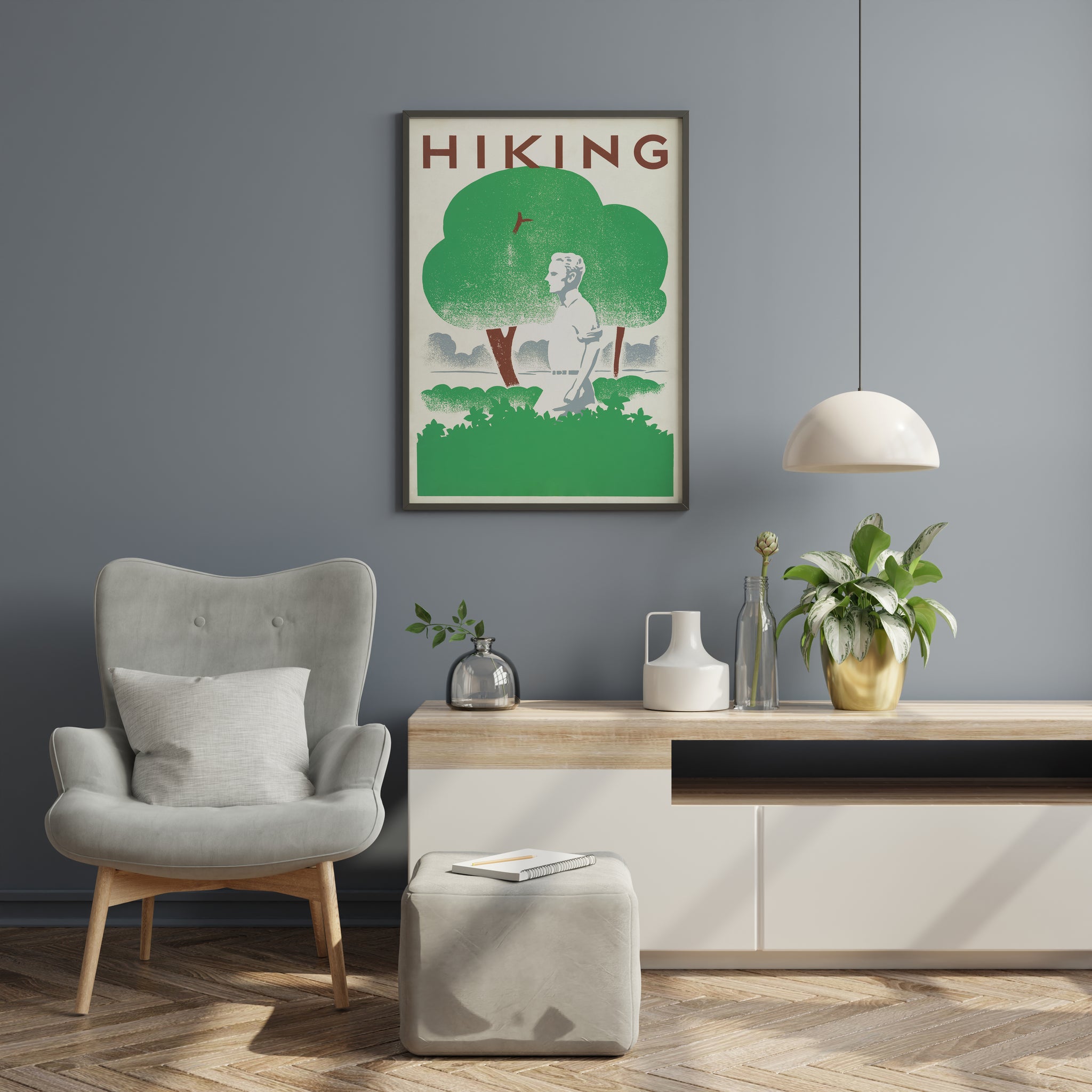 Retro hiking poster with a lone walker beneath green trees, displayed as outdoor adventure wall art in a moody living room.